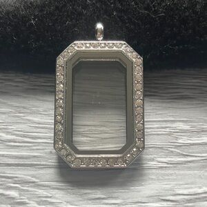 Rhinestone locket necklace.